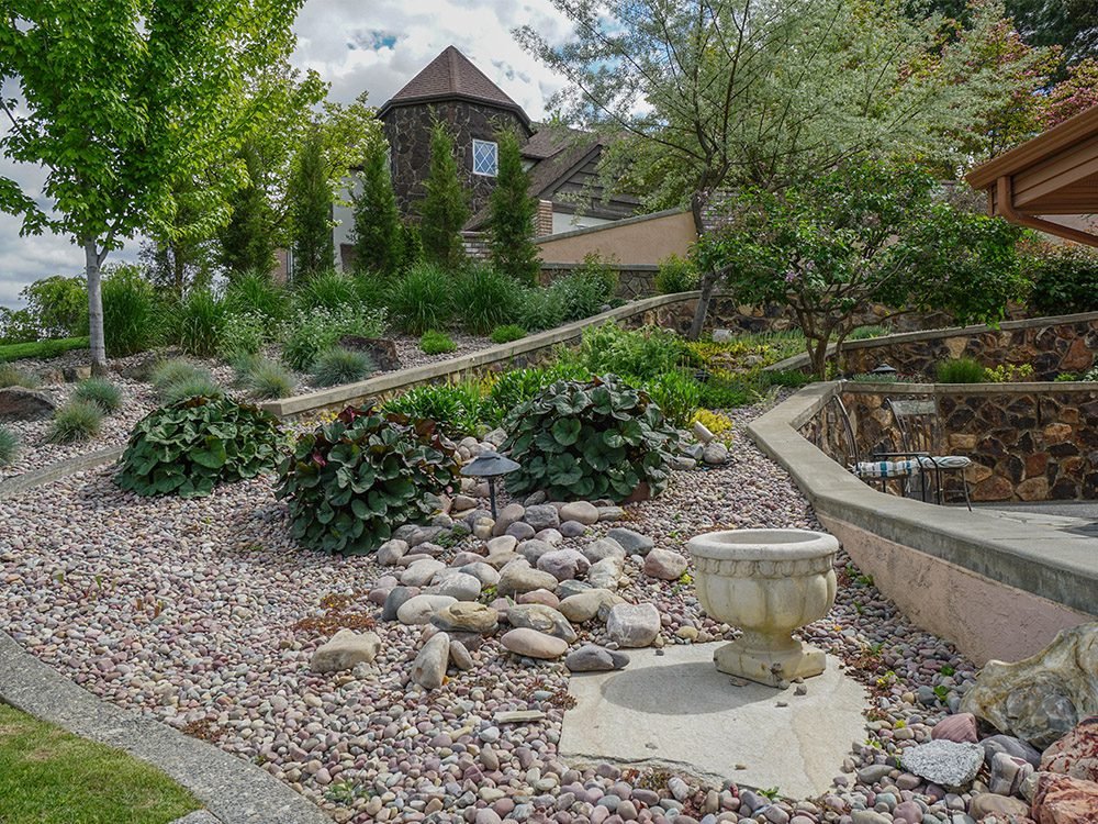 tiered stone walls with landscaping